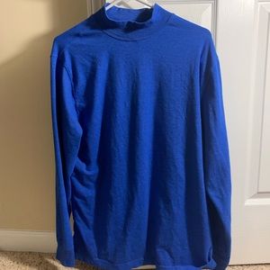 Blue mock turtleneck long sleeve shirt.